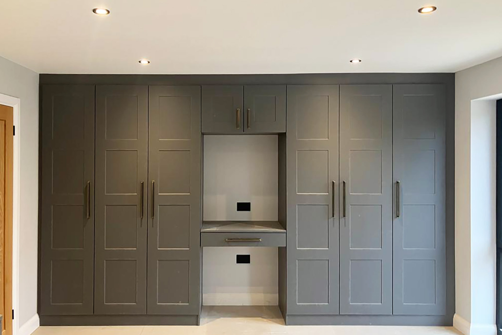 Fitted wardrobes by DC Interiors Sheffield and Doncaster - this space showcases the Hampton door in onyx grey.