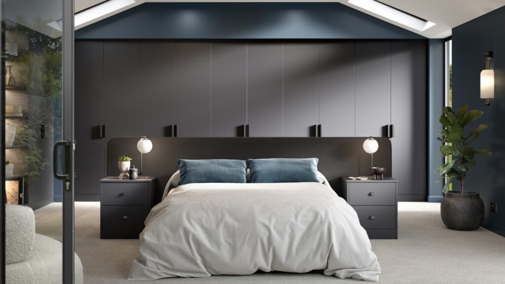 Aubergine coloured fitted wardrobes and sleeping area with cabinets by DC Interiors in Sheffield